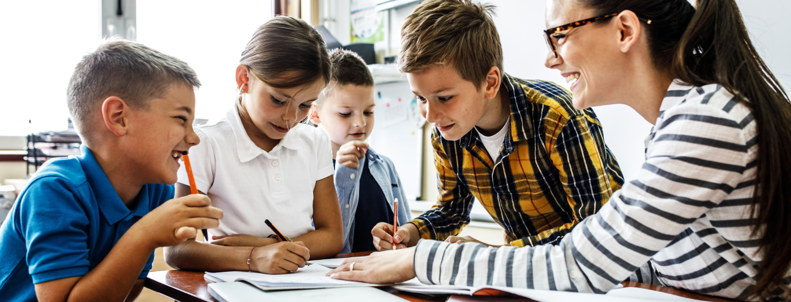 Teacher with her students in the classroom.